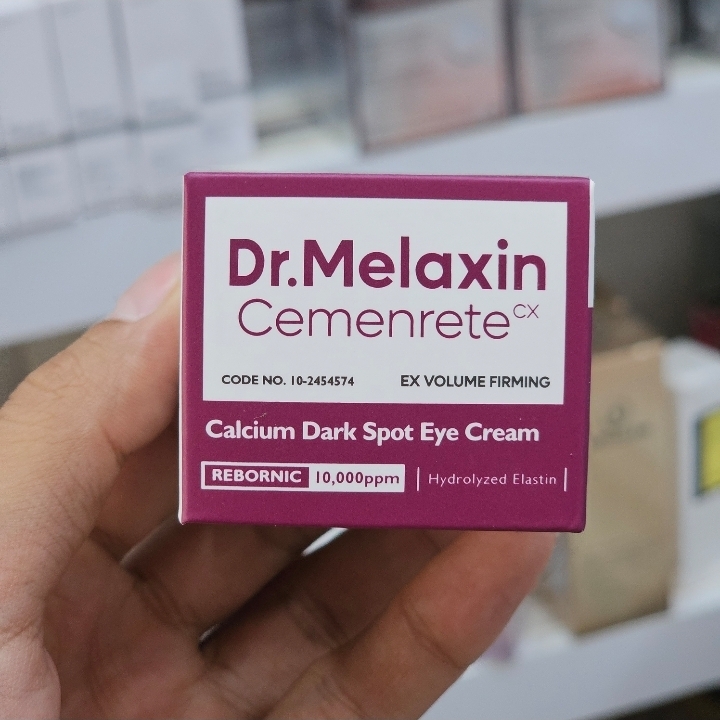 دور چشم کلسیم دارک اسپات دکتر ملاکسین Dr.Melaxine سفت کننده پوست و از بین برنده تیرگی حجم 15 گرمی